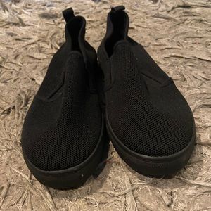Brand new black slip ons